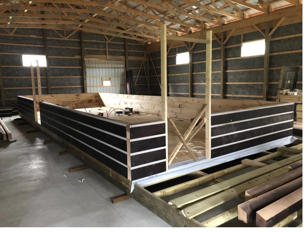 Cabin wall construction in Michigan workshop